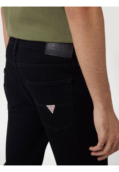 Jeans uomo skinny Guess Chris in denim nero bi-stretch  | Mariadesole.