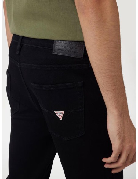 Jeans uomo skinny Guess Chris in denim nero bi-stretch  | Mariadesole.