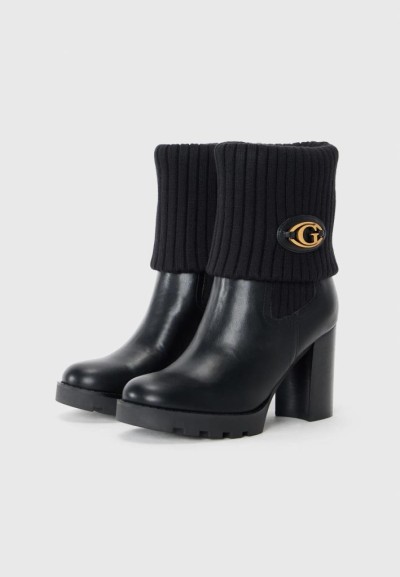 Stivaletti Donna Guess Neason con Tacco Largo e Borchie  | Mariadesole