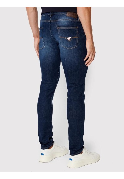 Jeans uomo Guess Chris blu scuro Super Skinny Fit in cotone riciclato 