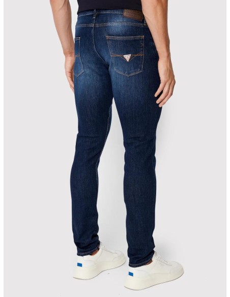 Jeans uomo Guess Chris blu scuro Super Skinny Fit in cotone riciclato 